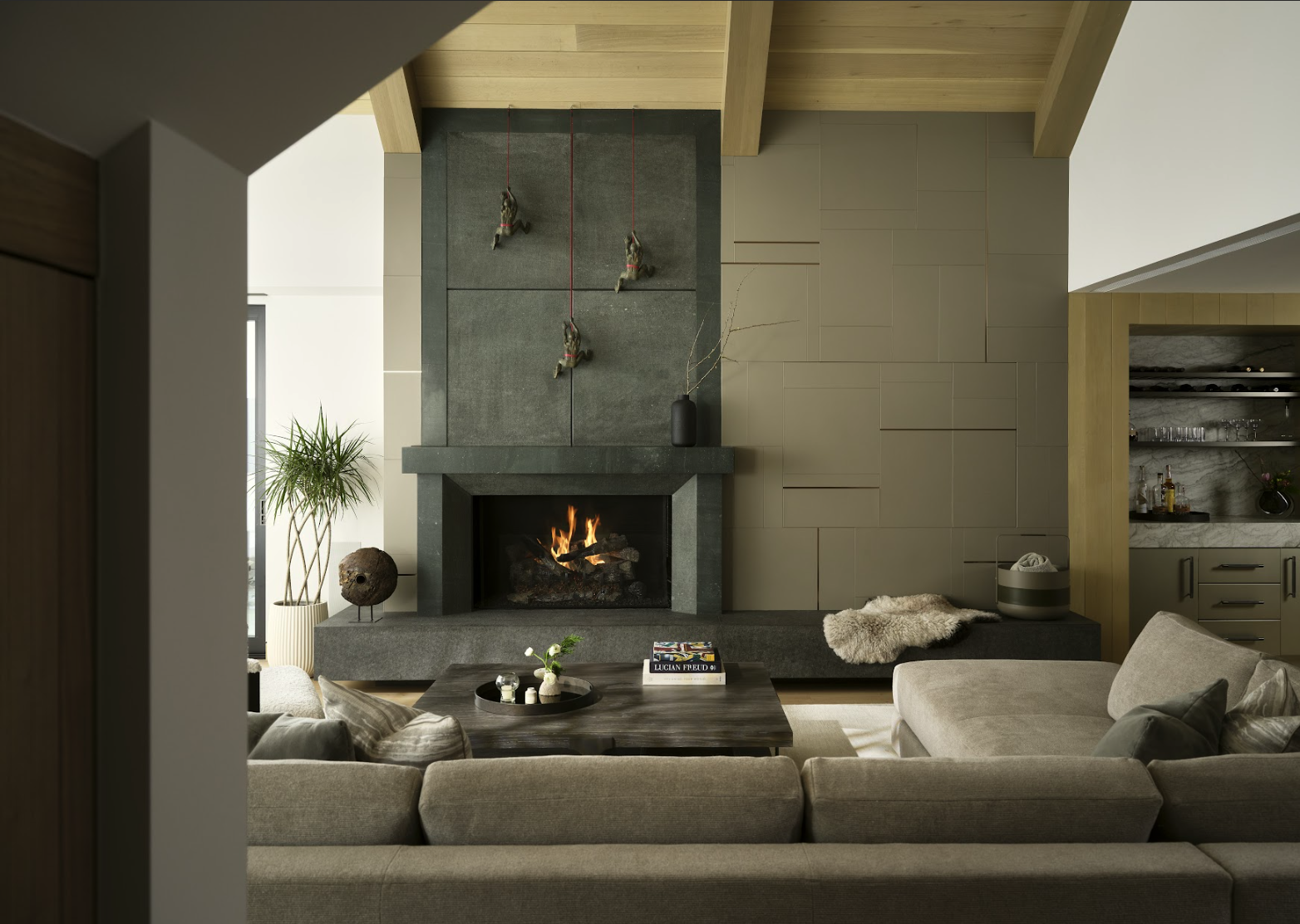 Fireplace with climbing art sculptures
